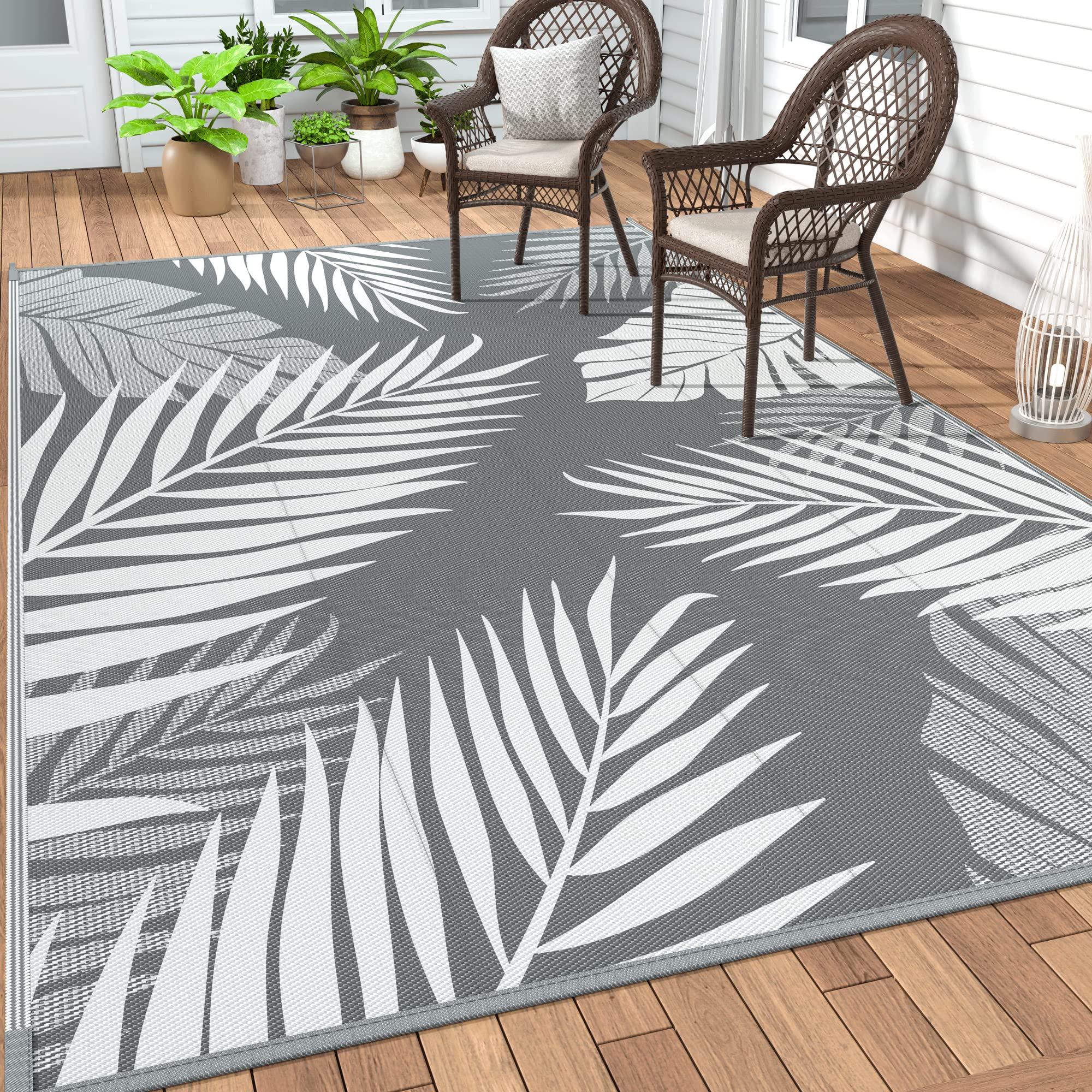 GENIMO reversible outdoor rug shown flat with leaf pattern
