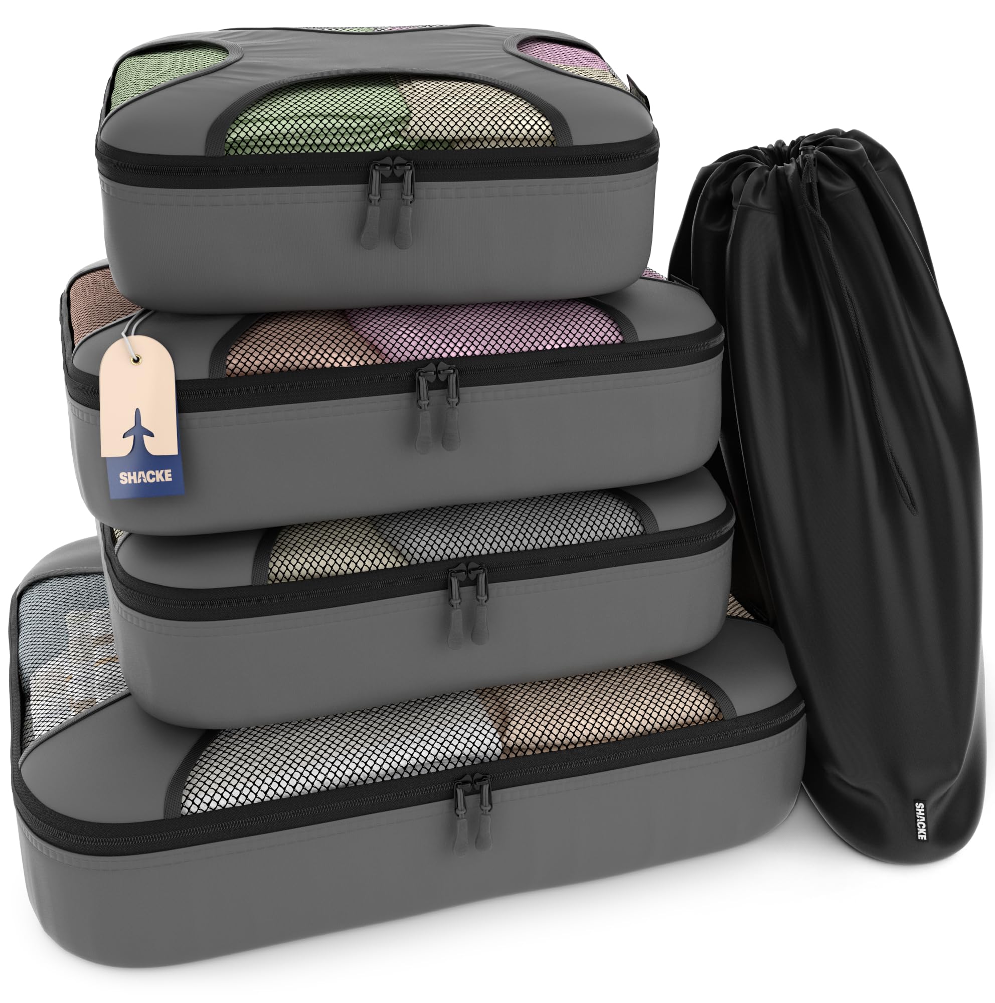 Shacke Pak 5-set packing cubes stacked with the drawstring laundry bag